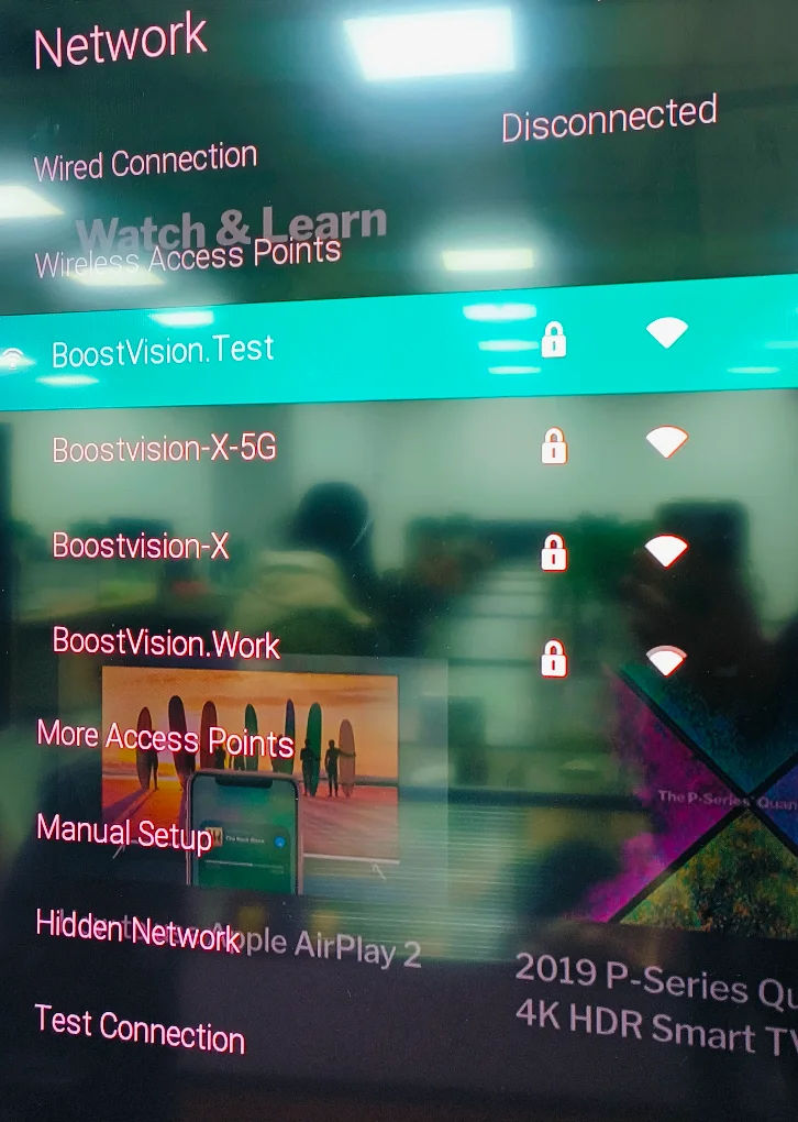 access the network connection menu on Vizio TV